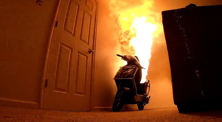 e-Scooter on fire in a living room