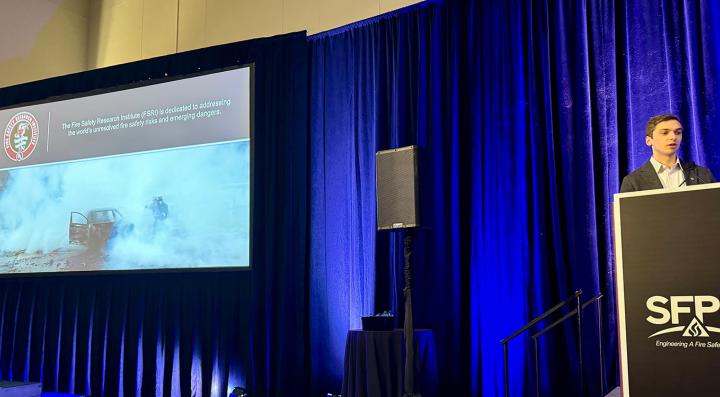 Nate Sauer speaking at the SFPE symposium