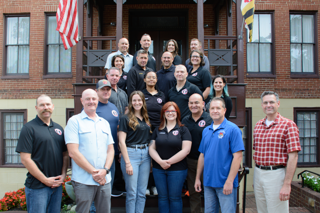 TAC Members standing in a  group photo 