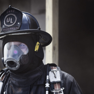 Firefighter wearing PPE mask